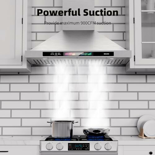 Modern kitchen range hood with powerful suction over stove.